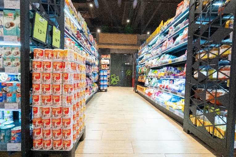 A store with shelves of foodDescription automatically generated