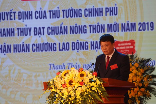 Ông Dương Quốc Lâm - Phó Bí thư huyện ủy, Chủ tịch UBND huyện Thanh Thủy báo cáo những thành tựu của huyện Thanh Thủy đã đạt được trong những năm qua  - Ảnh: Sơn Thủy