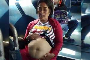 Cảnh giác: Bụng mỡ giả mang bầu để xin tiền trên xe buýt