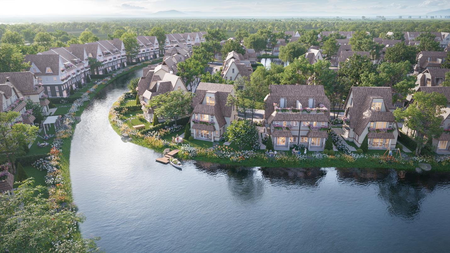 A group of houses on a river

Description automatically generated