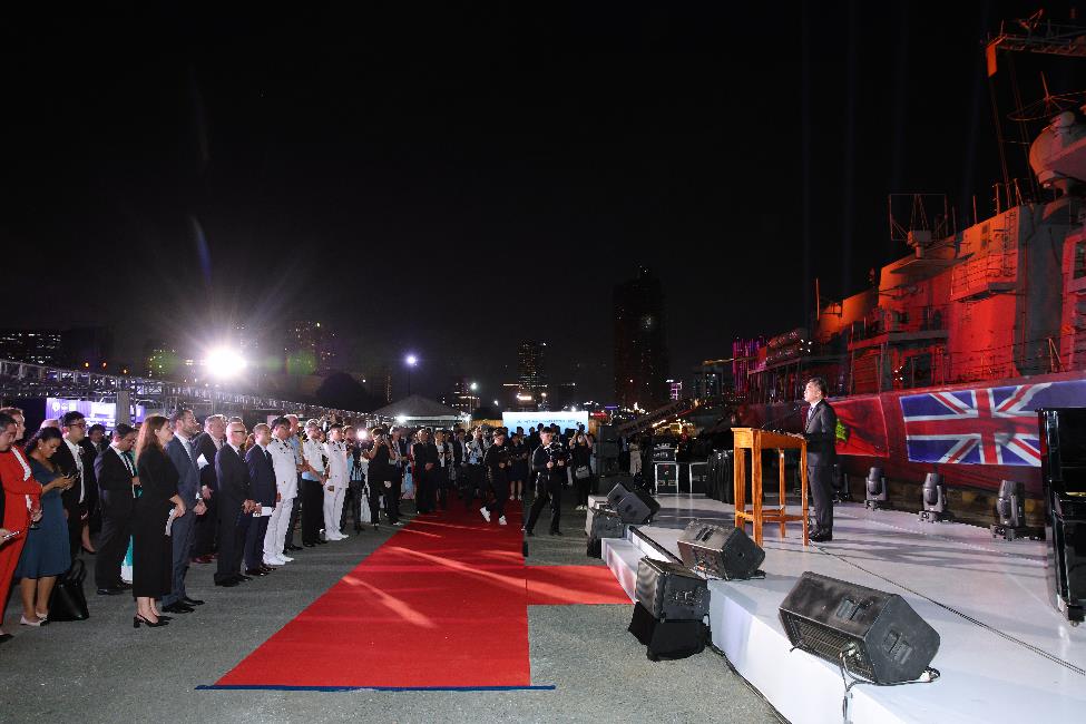 A group of people standing on a stage

AI-generated content may be incorrect.