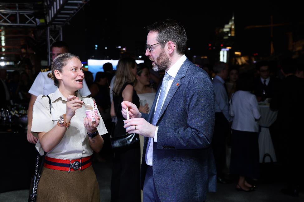 A person and person talking at a party

AI-generated content may be incorrect.