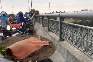 Sau khi đi khám bệnh, một phụ nữ gieo mình xuống sông tự tử