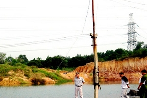 Vụ 3 cháu nhỏ bị điện giật chết: Điện lực Quảng Ninh chối trách nhiệm