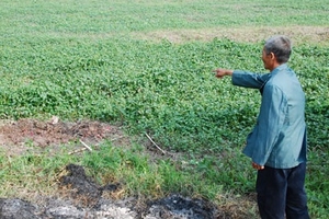 Xác phụ nữ dưới máng nước cạn 10 tháng trời