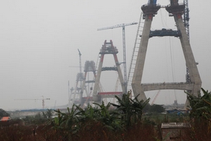 Chậm bàn giao mặt bằng dự án cầu Nhật Tân:Khó đòi 200 tỉ đồng!