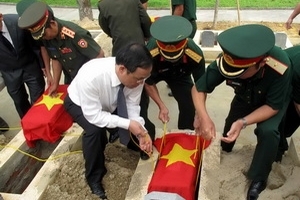 Truy điệu 30 hài cốt liệt sỹ Việt Nam hy sinh ở Lào