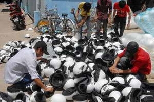 Tăng kiểm soát về chất lượng mũ bảo hiểm xe máy