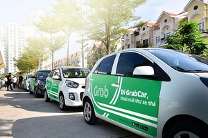 'Cuộc chiến taxi': Cục Thuế TP HCM thanh tra Grab, Uber