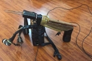 Bắt đôi nam nữ mang súng tự chế đi bắn chó