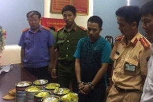 ‘Ngụy trang’ 8kg ma túy đá trong hộp sữa