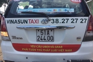 Dán logo phản đối Grab-Uber: Còn 2 doanh nghiệp chưa báo cáo