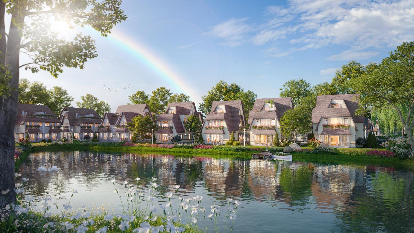 A rainbow over a row of houses

Description automatically generated