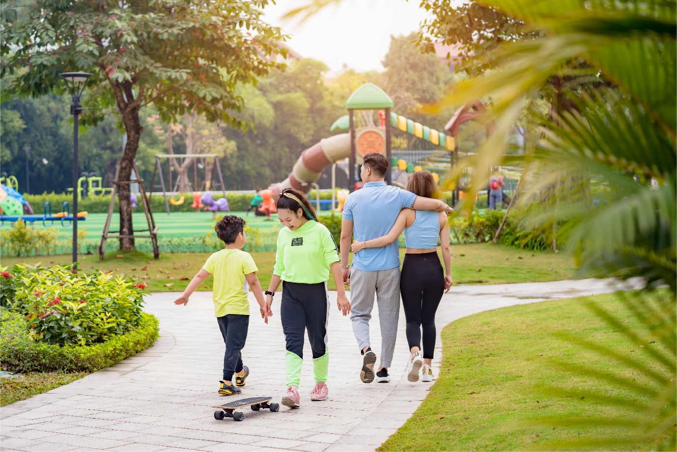 A group of people walking on a path

Description automatically generated